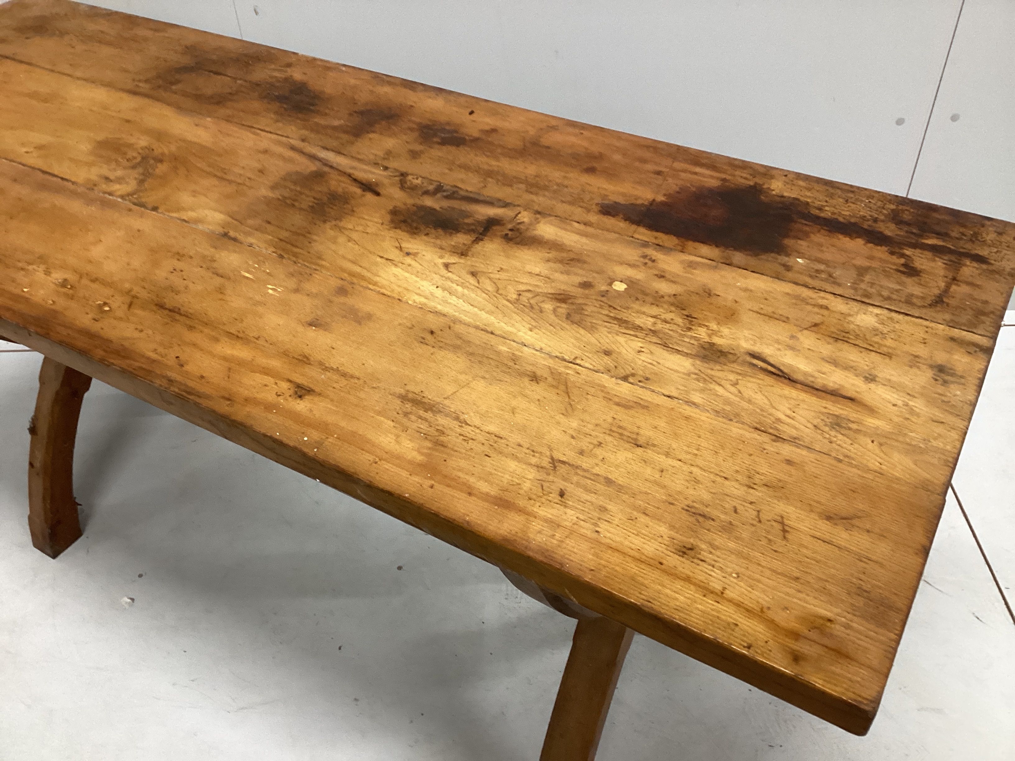 An Arts and Crafts style rectangular elm tavern type table, width 153cm, depth 60cm, height 74cm